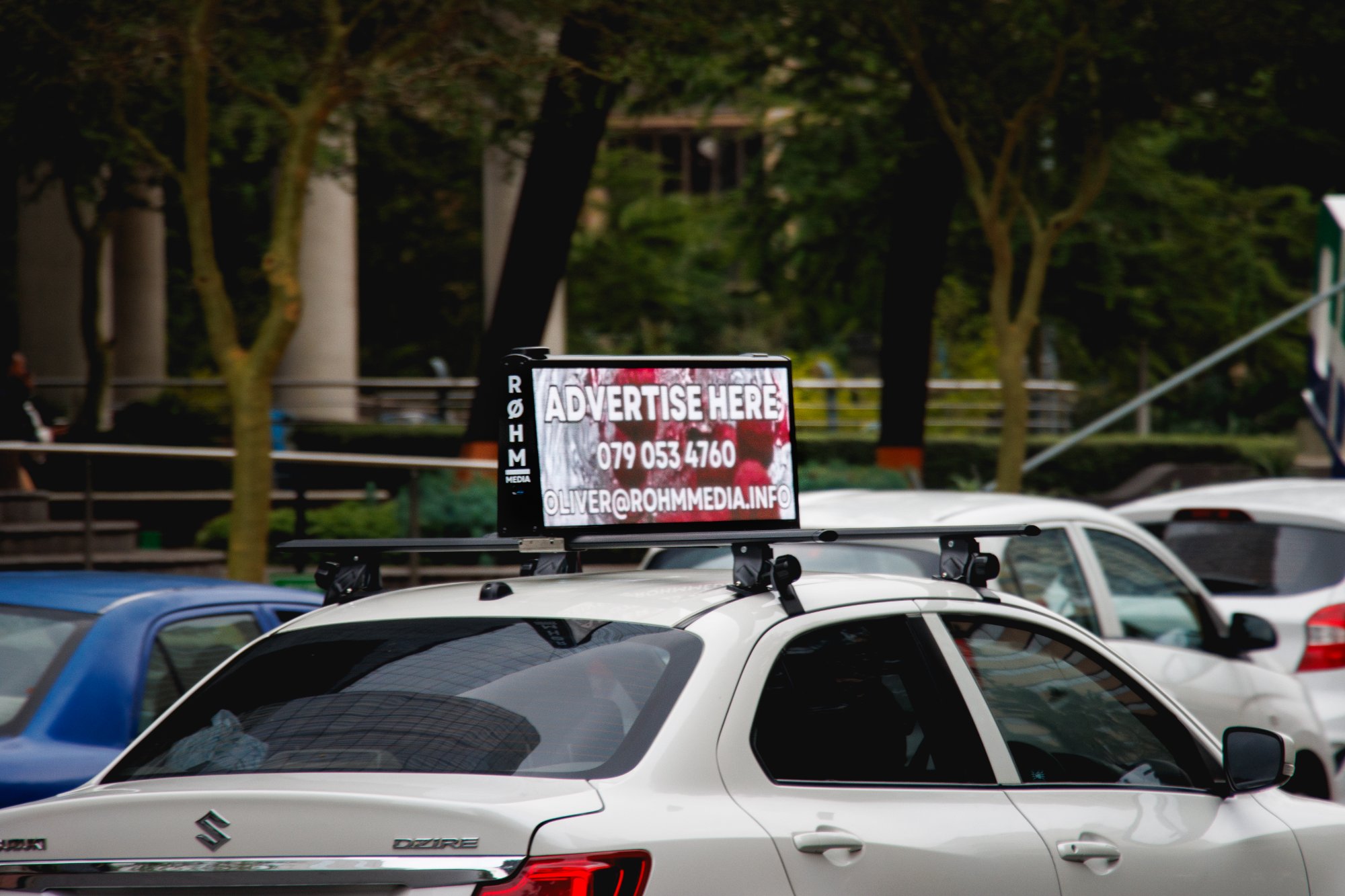 Close-up of ROHM Media digital screen showing Bridgement ad